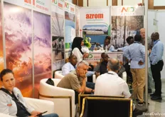 Busy booth at Azrom, supplier of greenhouses, irrigation and installation.