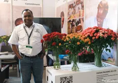 Philip Kitumu with Fataki packaging
