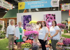 Doug Parkinson, McKenna Merkel, Ericka Filonczuk and Michaela Tufnell from Proven Winners, standing next to one of their new varieties of petunia: Supertunia Tiara Pink