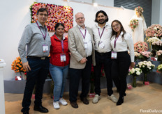 At the booth of Conectiflor with Leonardo Diaz, Veronica Patino, President Dean Rule and Jennifer Velasco