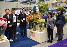 The team of Japan Flowers and Plants, highlighting two of their best sellers, namely Gloriosa Souther Wind and Lilium Mimori .