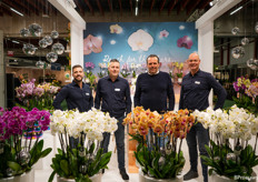 Team of Piet Vijverberg surrounded by orchids and disco balls