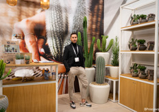 Harold Burger of Ubink next to a large cacti, presented here to boost the image of the cactus again